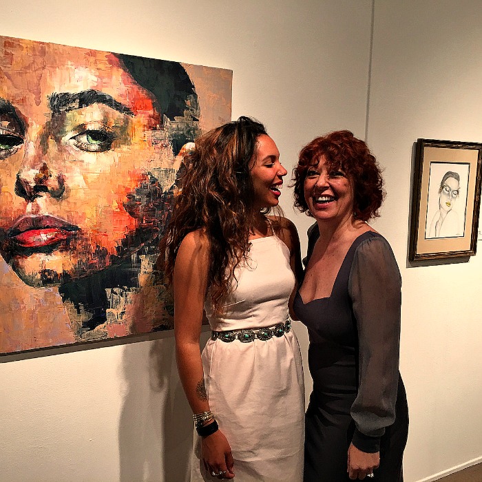 Female artists supporting each other: Taylor Smalls and I with my newly acquired painting