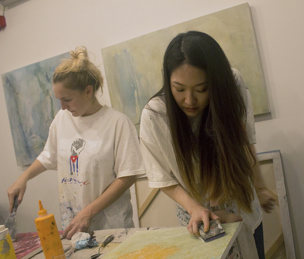 Students use Clara Berta's painting techniques at Yelp Ladies Night In art class