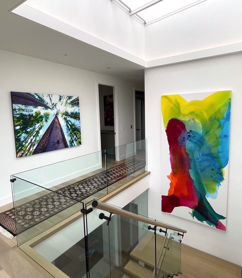 Custom commissioned colorful abstract painting by artist Clara Berta installed into an art collector's home hallway