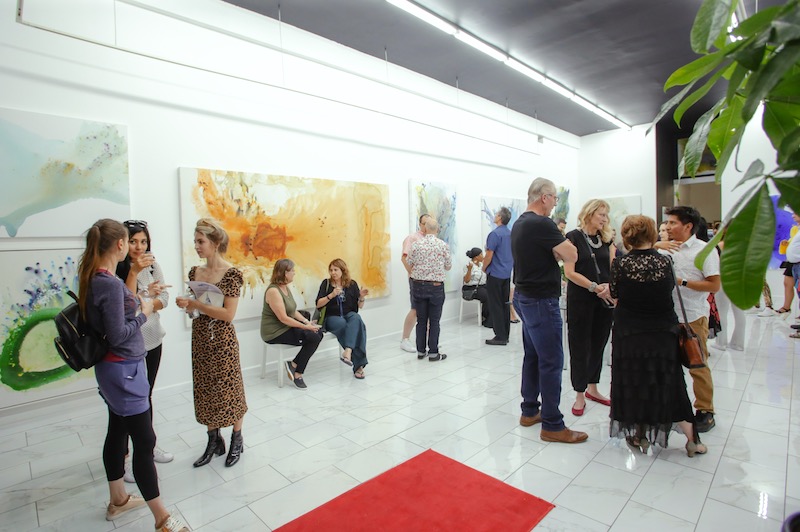 Guests enjoy the opening celebration of BertaArt Studio Gallery