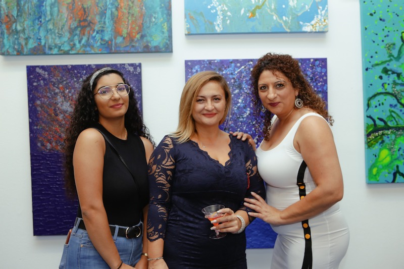Guests enjoy the opening celebration of BertaArt Studio Gallery