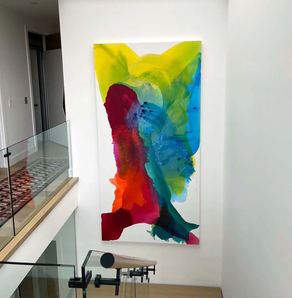abstract large scale art piece in a modern home staircase interior