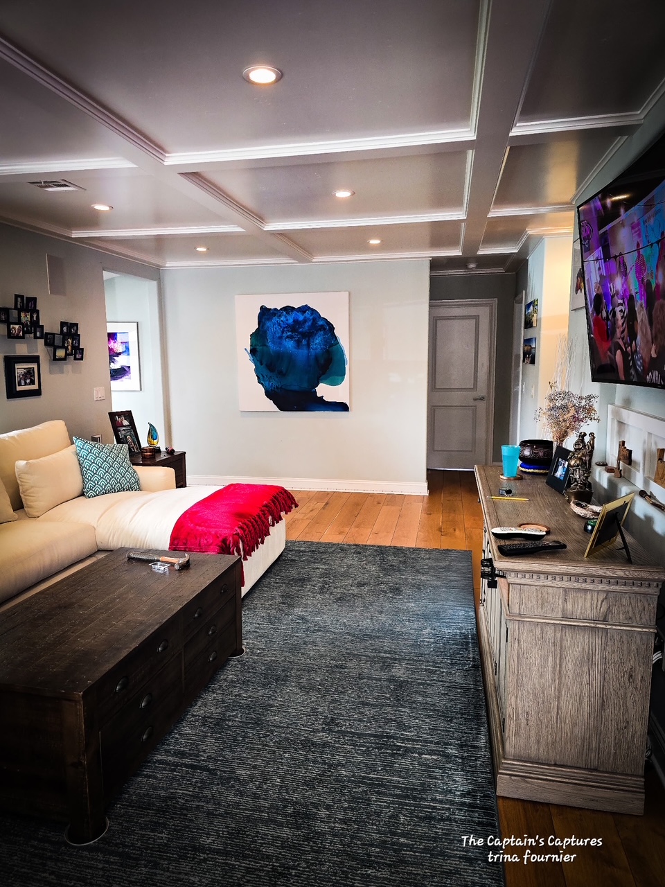 Portrait in Blue modern abstract wall art in a La Jolla residence. The artwork features layered blue tones and fluid depth, displayed on a minimalist white gallery wall.