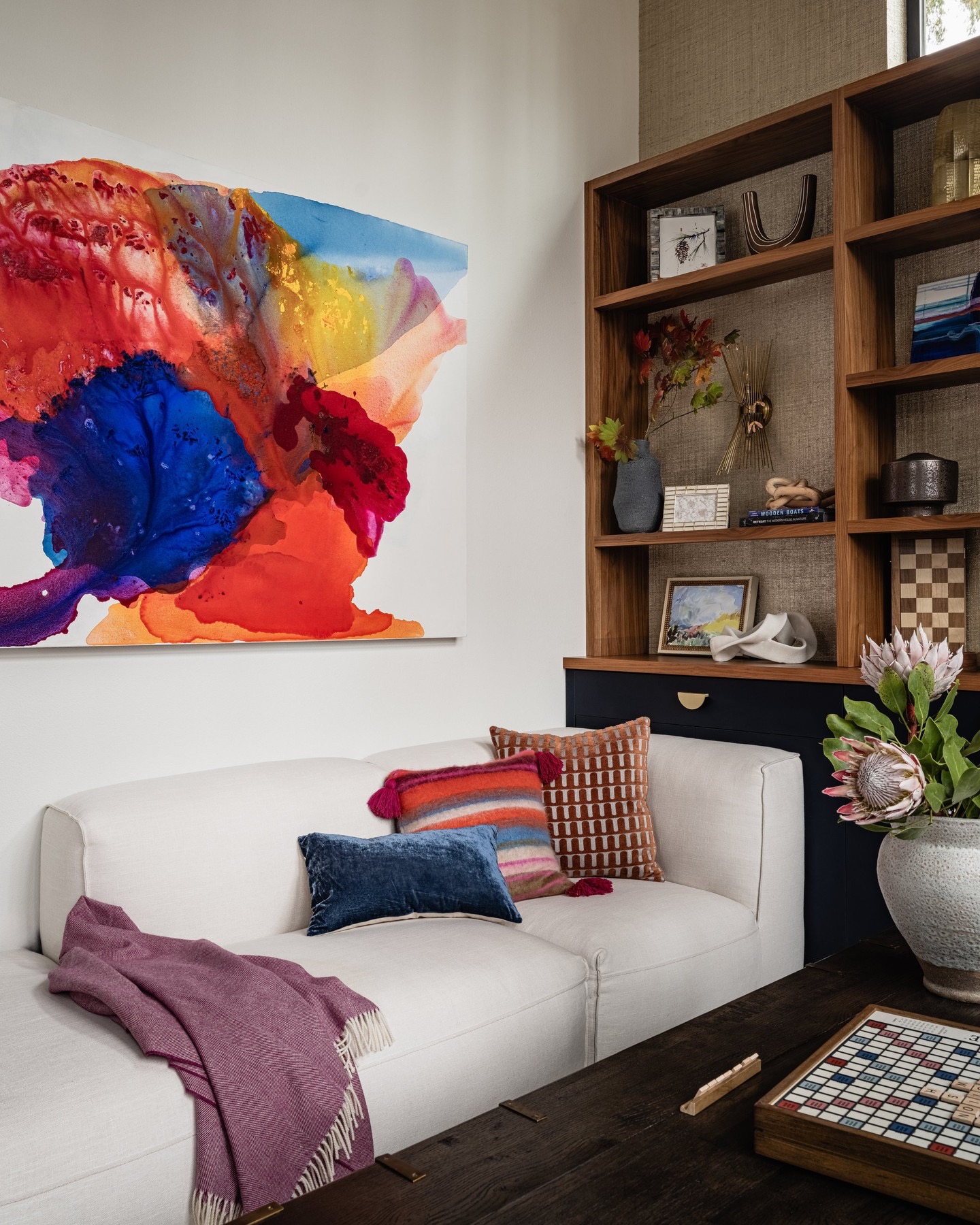 A 48x72-inch abstract acrylic canvas titled Dreamy Color, characterized by ethereal color washes and visible, gestural brushwork that adds depth to a contemporary residential interior.