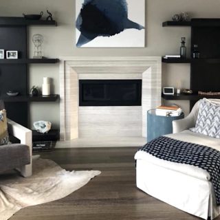 'Blue Jelly Fish' abstract painting by Clara Berta, 48 x 48 in, installed in a collector's dining room. Minimalist blue flowing abstract painting by artist Clara Berta installed into an art collector's modern interior living room