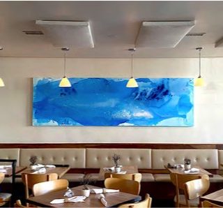 Commissioned abstract painting by Clara Berta for Kali Restaurant in California. Custom commissioned vibrant blue abstract painting by artist Clara Berta installed into a restaurant in California