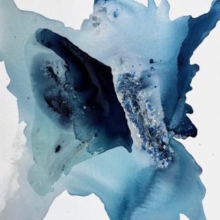 Clara Berta, Between Tides, Acrylic on canvas, 40 x 30 in. Abstract Art watercolor painting featuring fluid shades of blue and gray splashed outward from a dark central area, creating a dynamic, organic shape with textured details and soft blending at the edges.